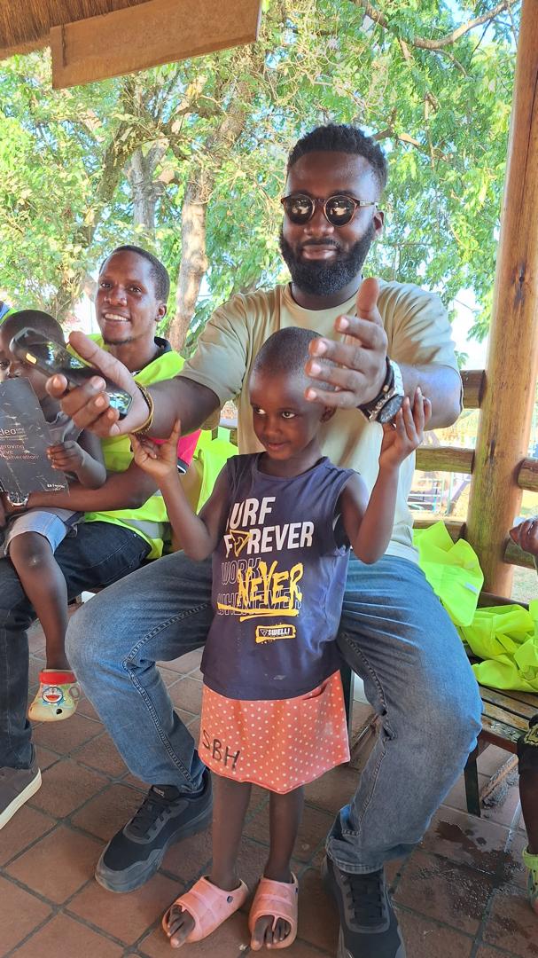 JulsPrint team visiting Sanyu Babies' Home